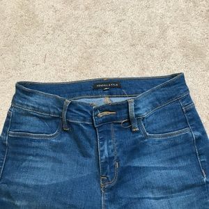 Kendall and Kylie partially ripped jeans.